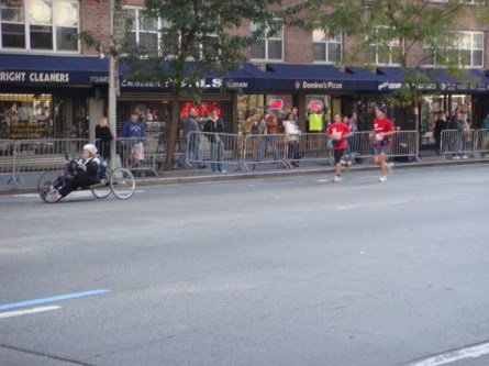 20071104-ny-marathon-17-wheelchair-racer-with-running-escort.jpg